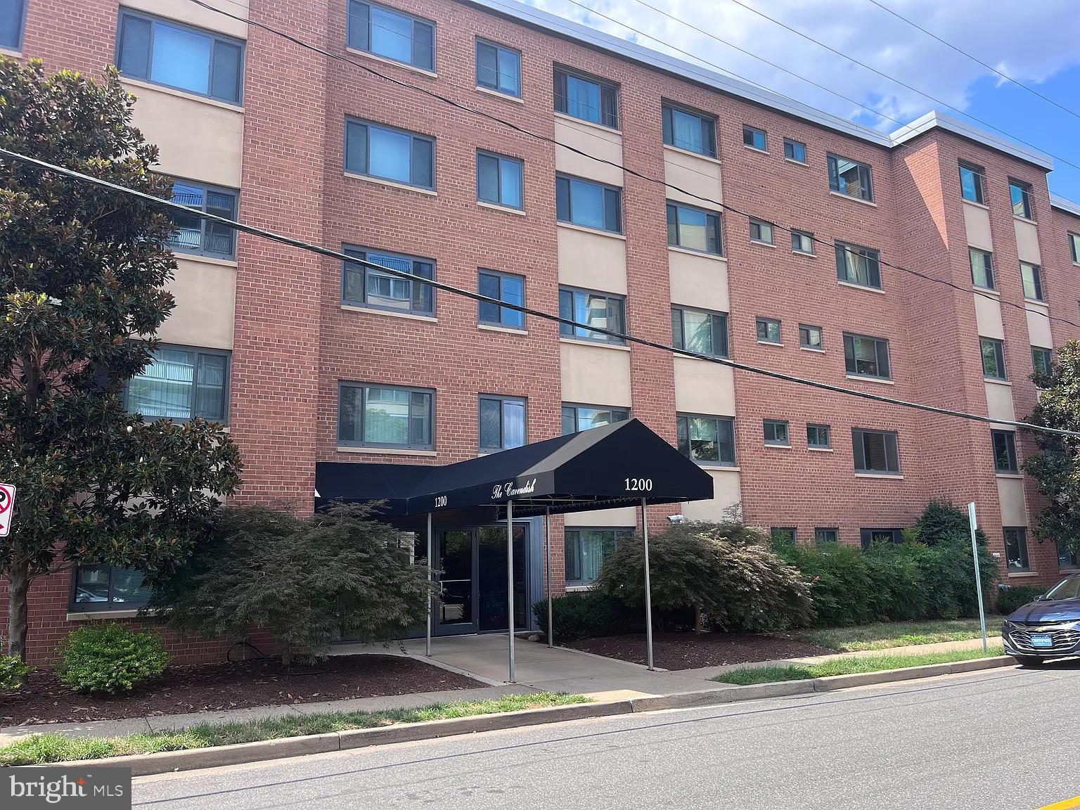 1200 South Arlington Road, Unit 504 Arlington, VA 22209 - Photo 18 of 20 a view of a building with a garden