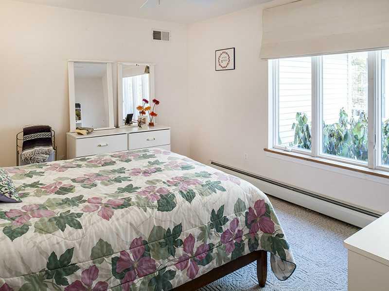 8 Walker Road Kennebunk, ME 04043 - Photo 10 of 24 Sunny bedroom two has lovely outdoor...