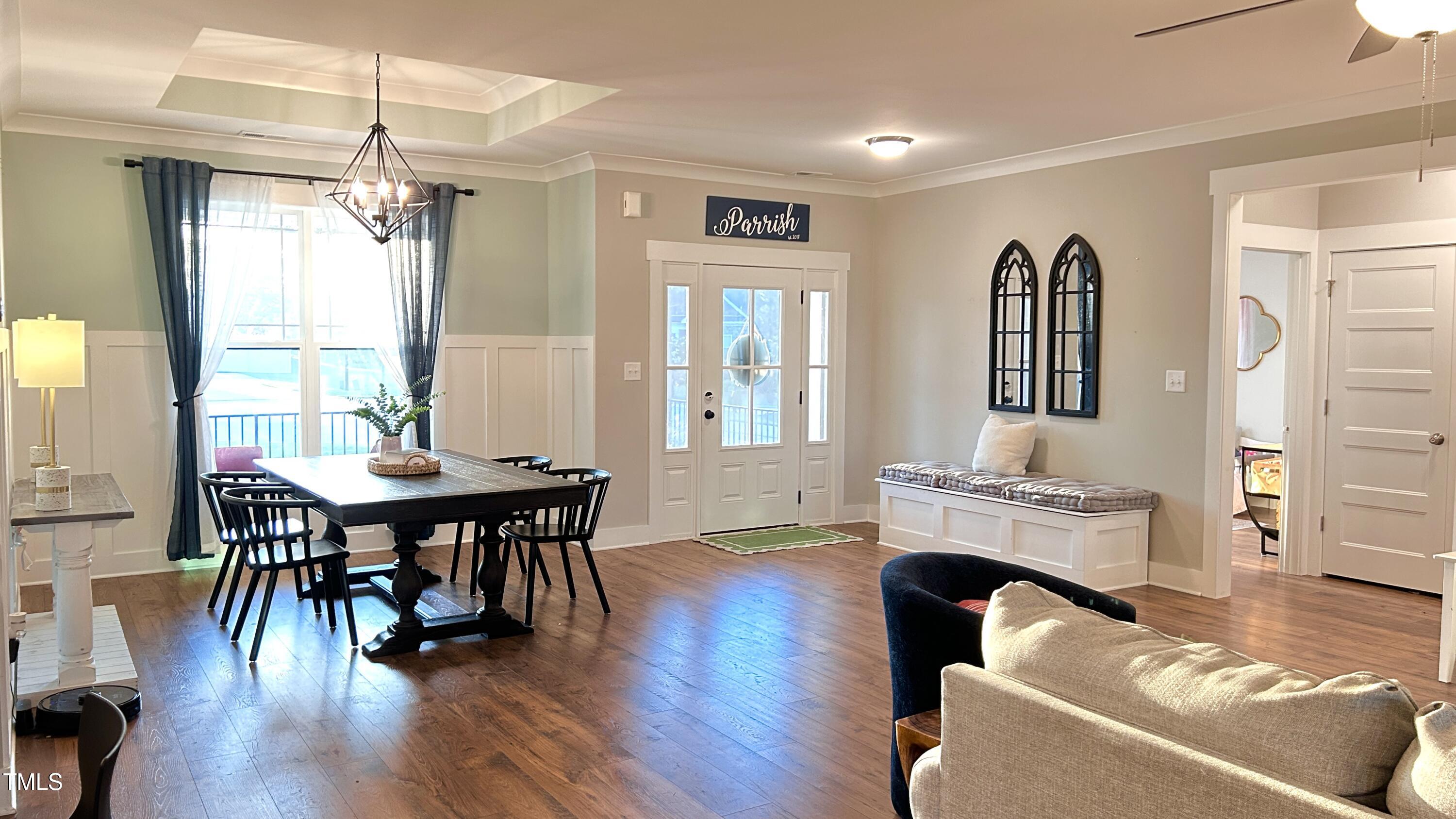 18 Pawnee Place Willow Spring, NC 27592 - Photo 6 of 35 a living room with furniture and a wooden floor
