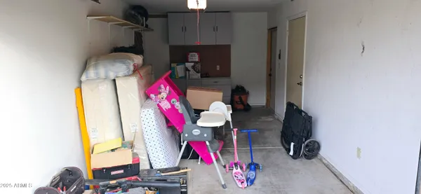 a view of gym equipment and children play room