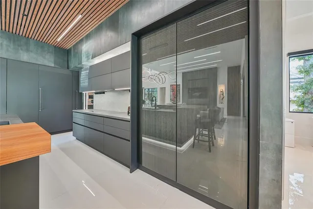 a bathroom with a tub and shower