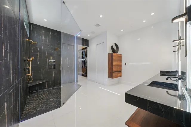 a bathroom with a sink and a shower