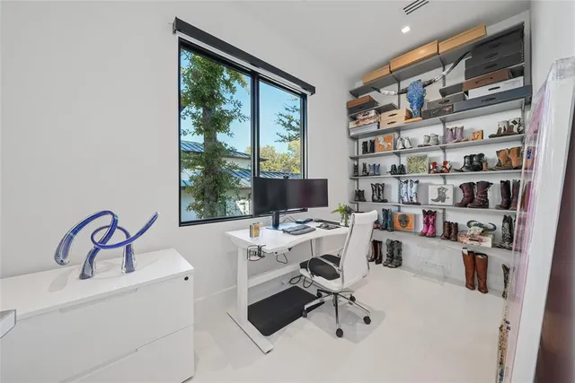 a workspace with furniture window and outside view