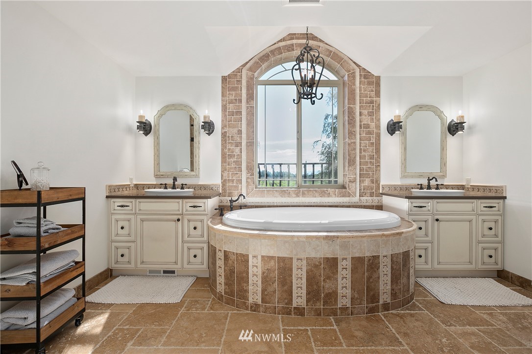 5745 Barr Road Ferndale, WA 98248 - Photo 20 of 40 a bathroom with a double vanity sink mirror and