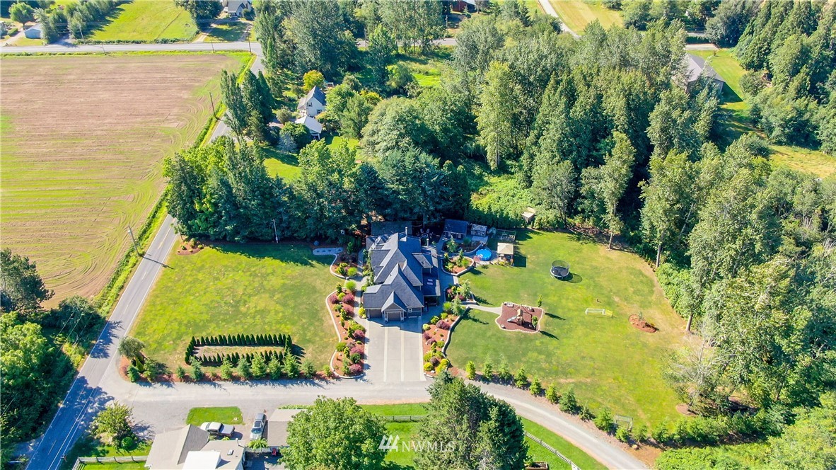 5745 Barr Road Ferndale, WA 98248 - Photo 39 of 40 a view of a swimming pool with an outdoor space