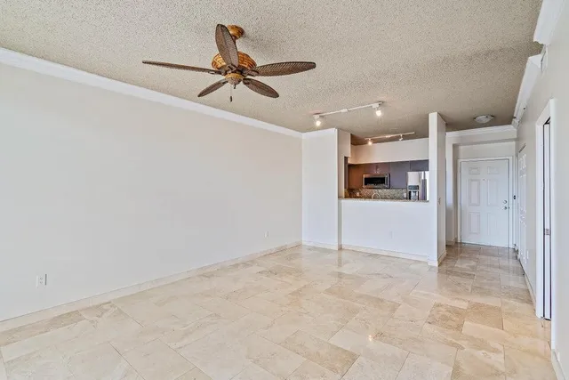 a view of a livingroom and a kitchen