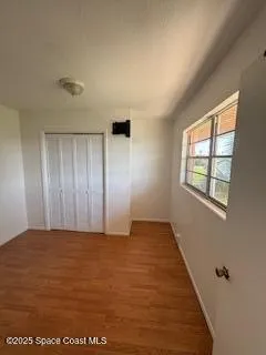 an aerial view of a house with outdoor space
