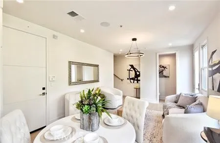 a bedroom with a bed and a desk