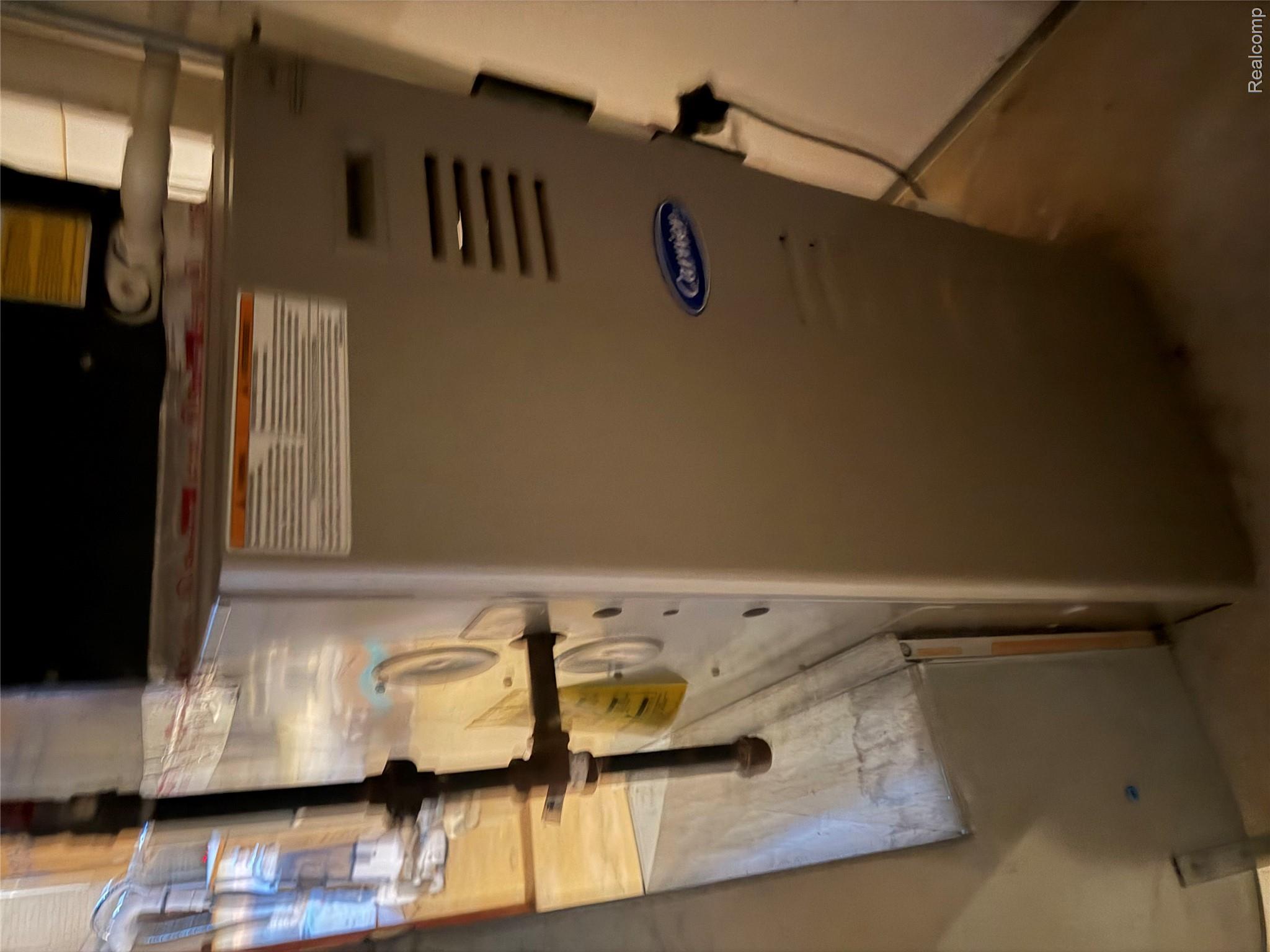 6860 Grand River Road Bancroft, MI 48414 - Photo 21 of 31 Utilities with heating unit