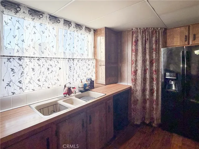 a bathroom with a sink and a large mirror
