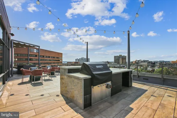 a view of a terrace with furniture