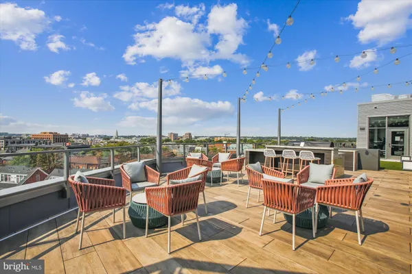 a view of a terrace with furniture