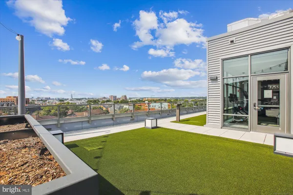 a view of a swimming pool with a lounge chairs