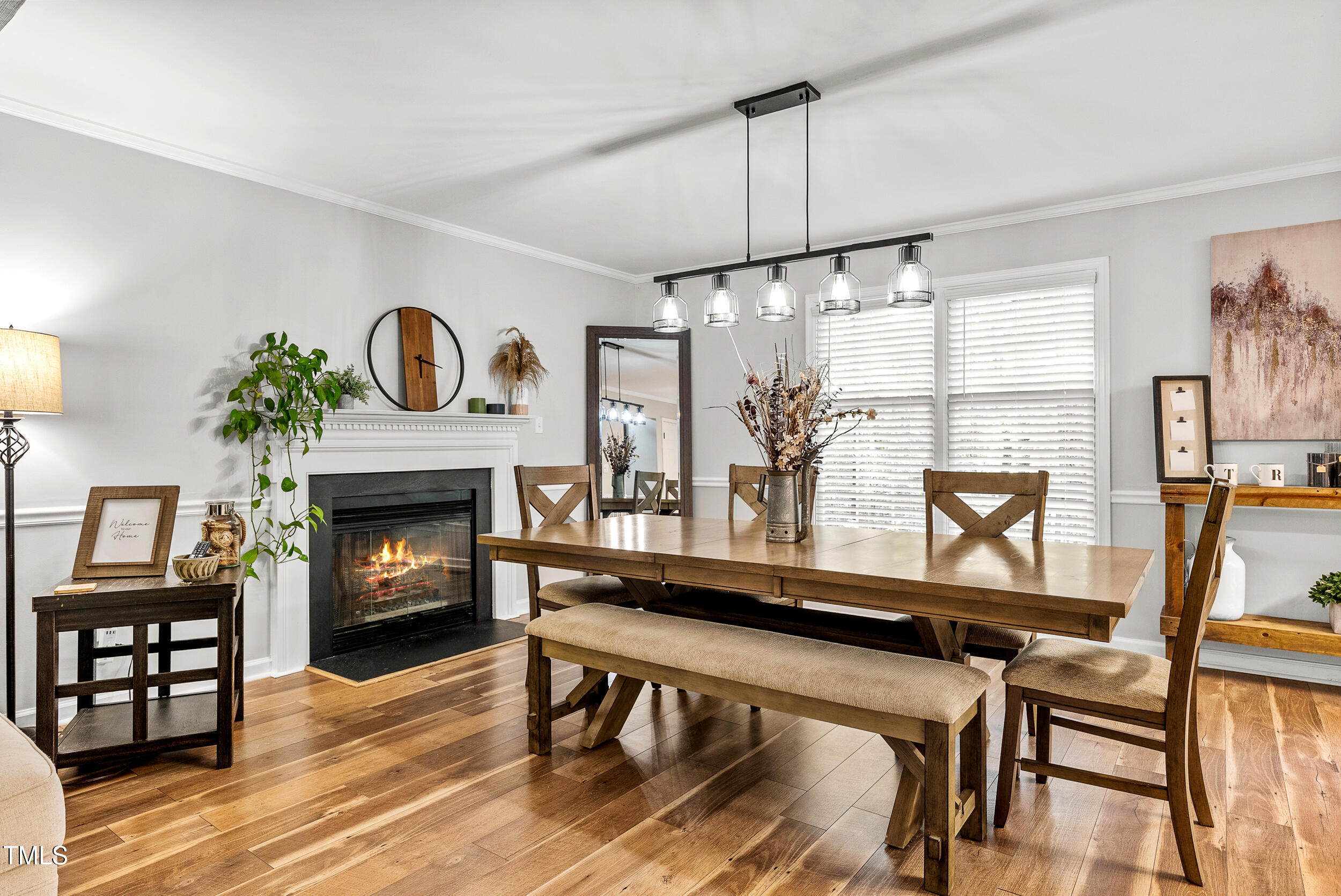 5701 Hadrian Drive Durham, NC 27703 - Photo 11 of 41 a view of a livingroom with furniture and a fireplace