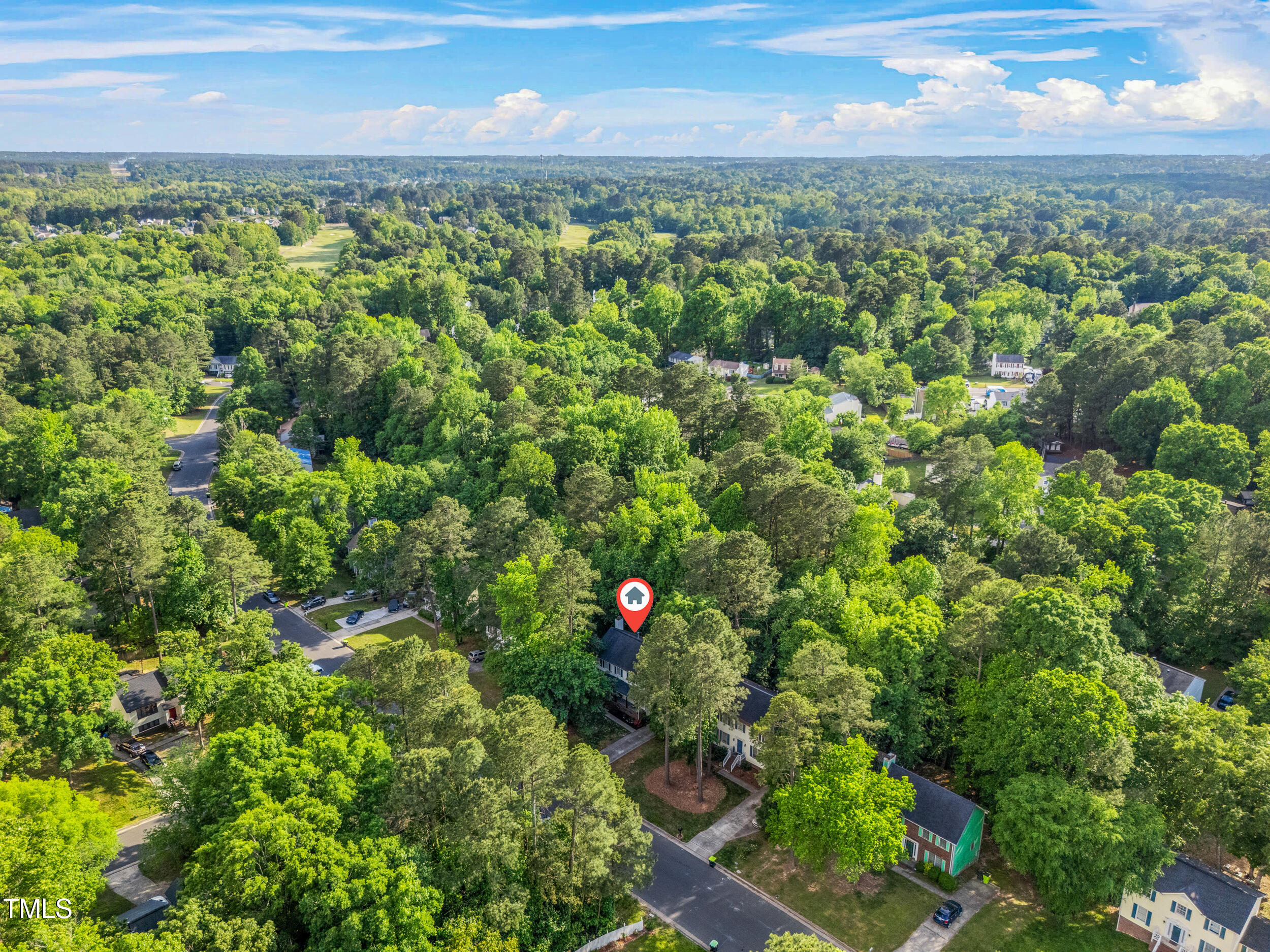 5701 Hadrian Drive Durham, NC 27703 - Photo 41 of 41 an aerial view of residential houses with outdoor space and trees