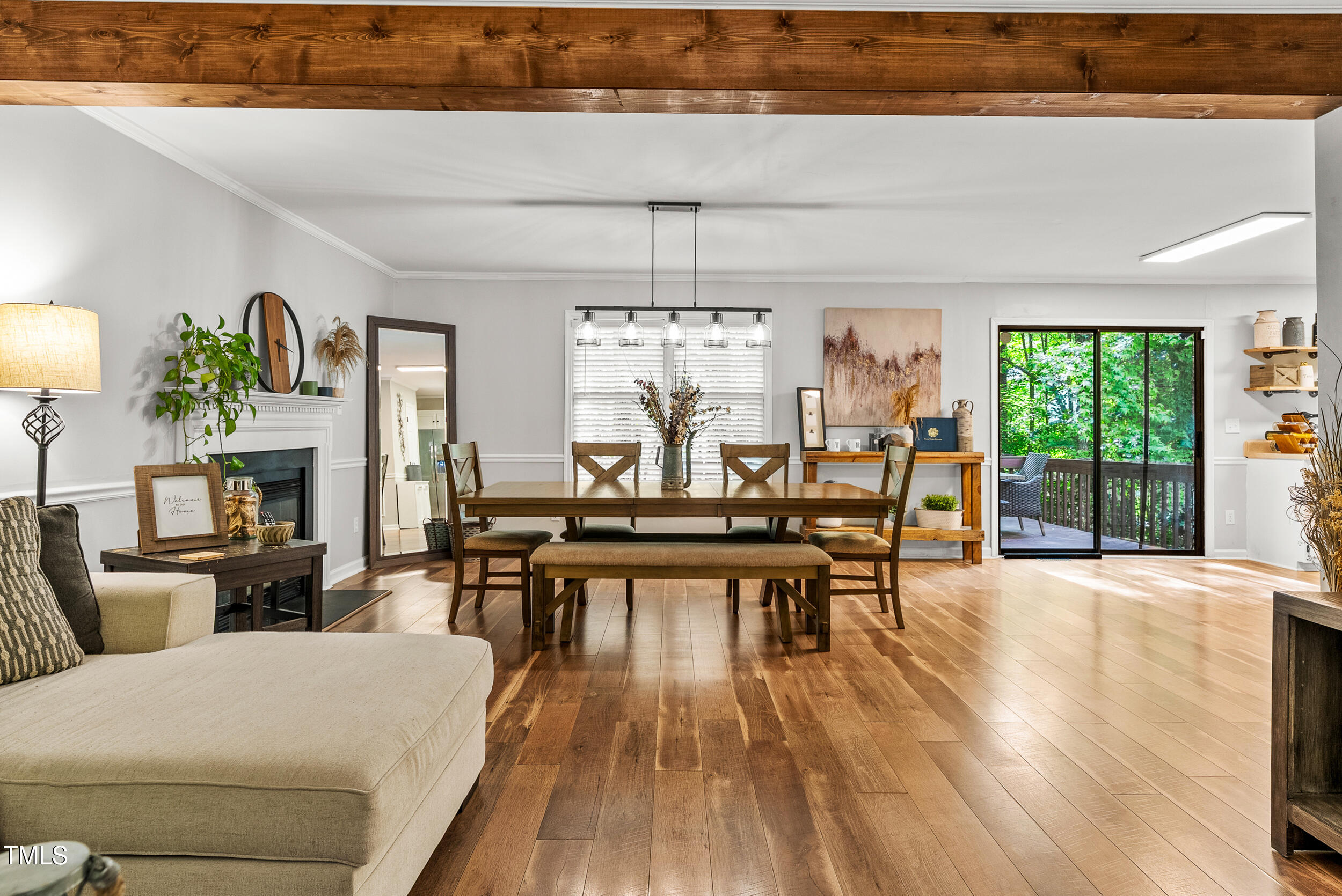 5701 Hadrian Drive Durham, NC 27703 - Photo 10 of 41 a view of a dining room with furniture window and outside view