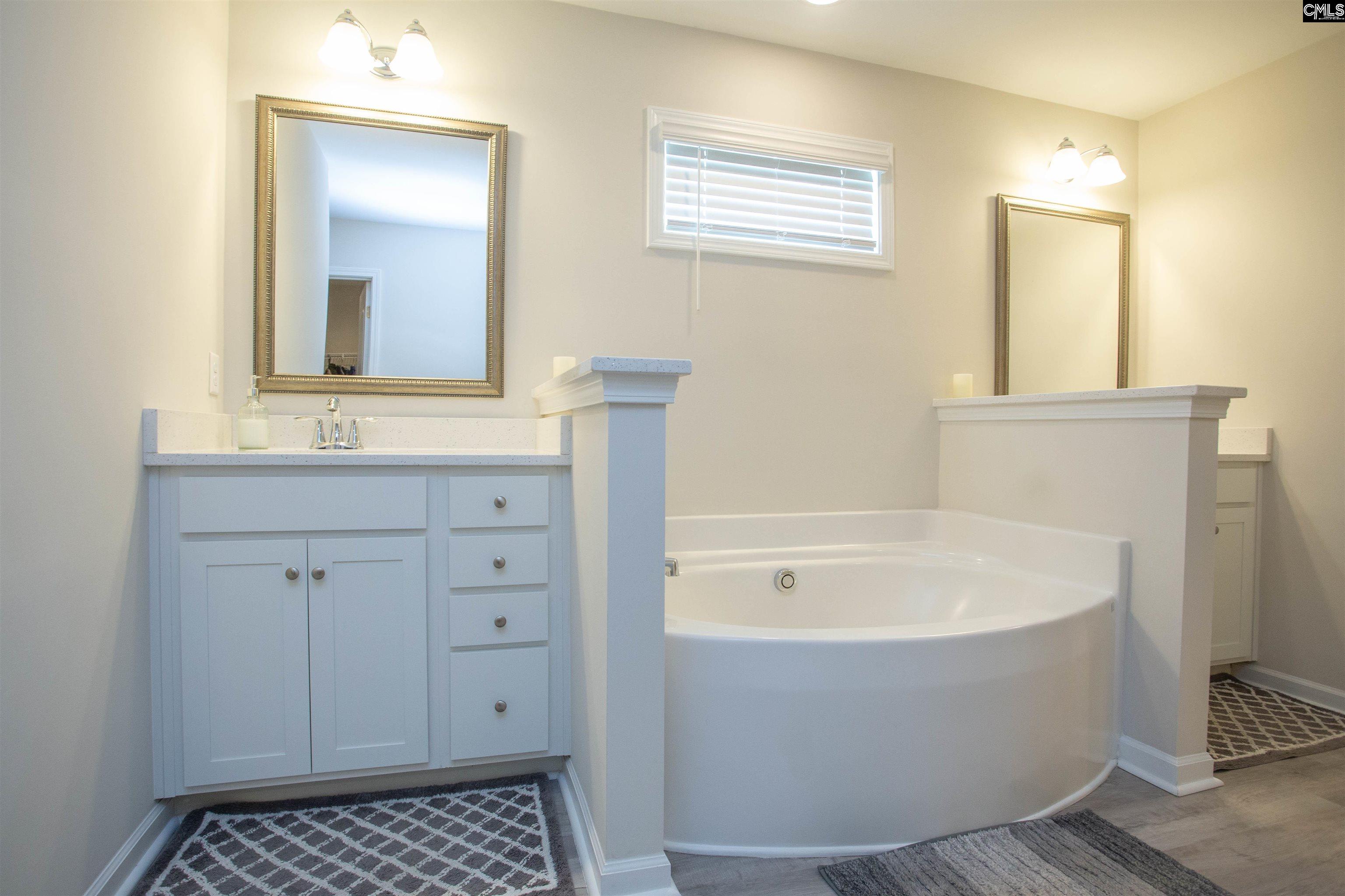 272 Shadowbrook Way Camden, SC 29020 - Photo 19 of 43 a bathroom with a bathtub and a sink