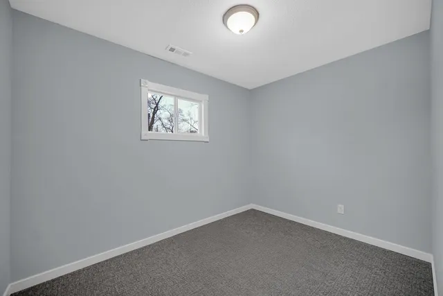 an empty room with a workbench