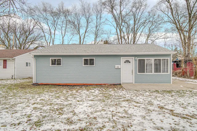 a house with yard in front of it