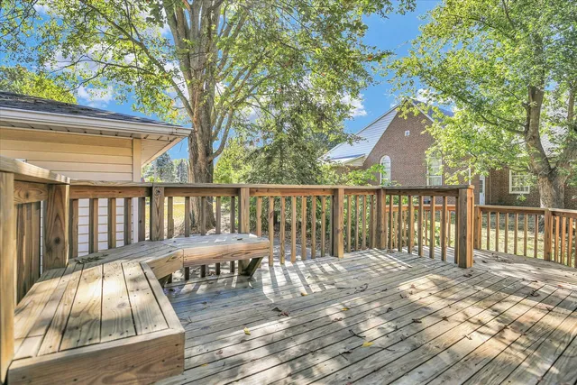 a kitchen with granite countertop cabinets stainless steel appliances and a counter space