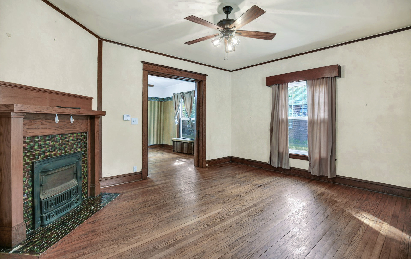 206 Illinois Street Mansfield, IL 61854 - Photo 27 of 74 a view of an empty room with wooden floor and a window