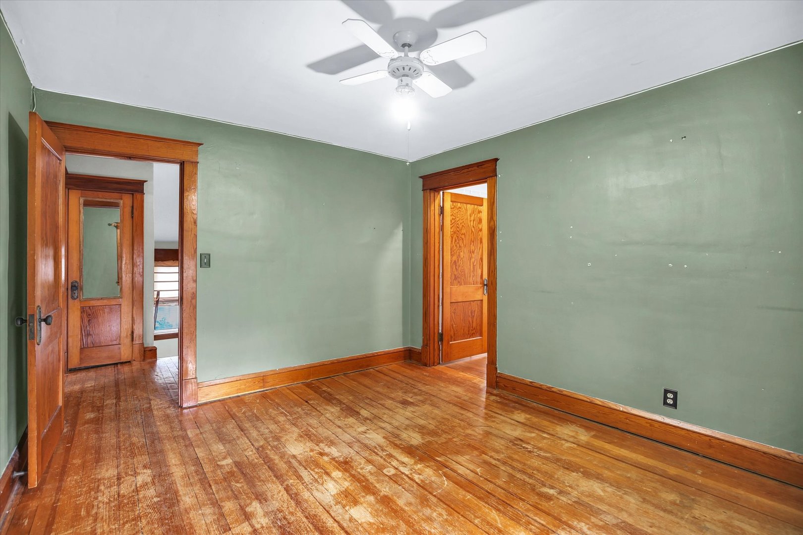 206 Illinois Street Mansfield, IL 61854 - Photo 44 of 74 wooden floor in an empty room with a window