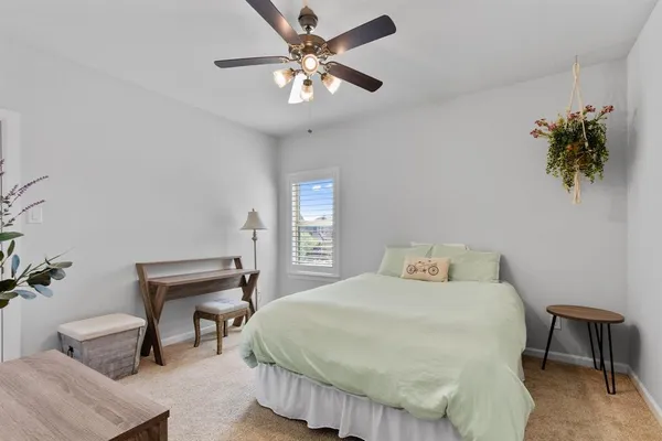 a bathroom with a sink toilet and vanity