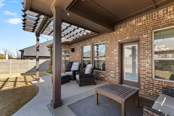 a backyard of a house with seating space