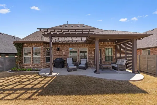 a front view of a house with patio