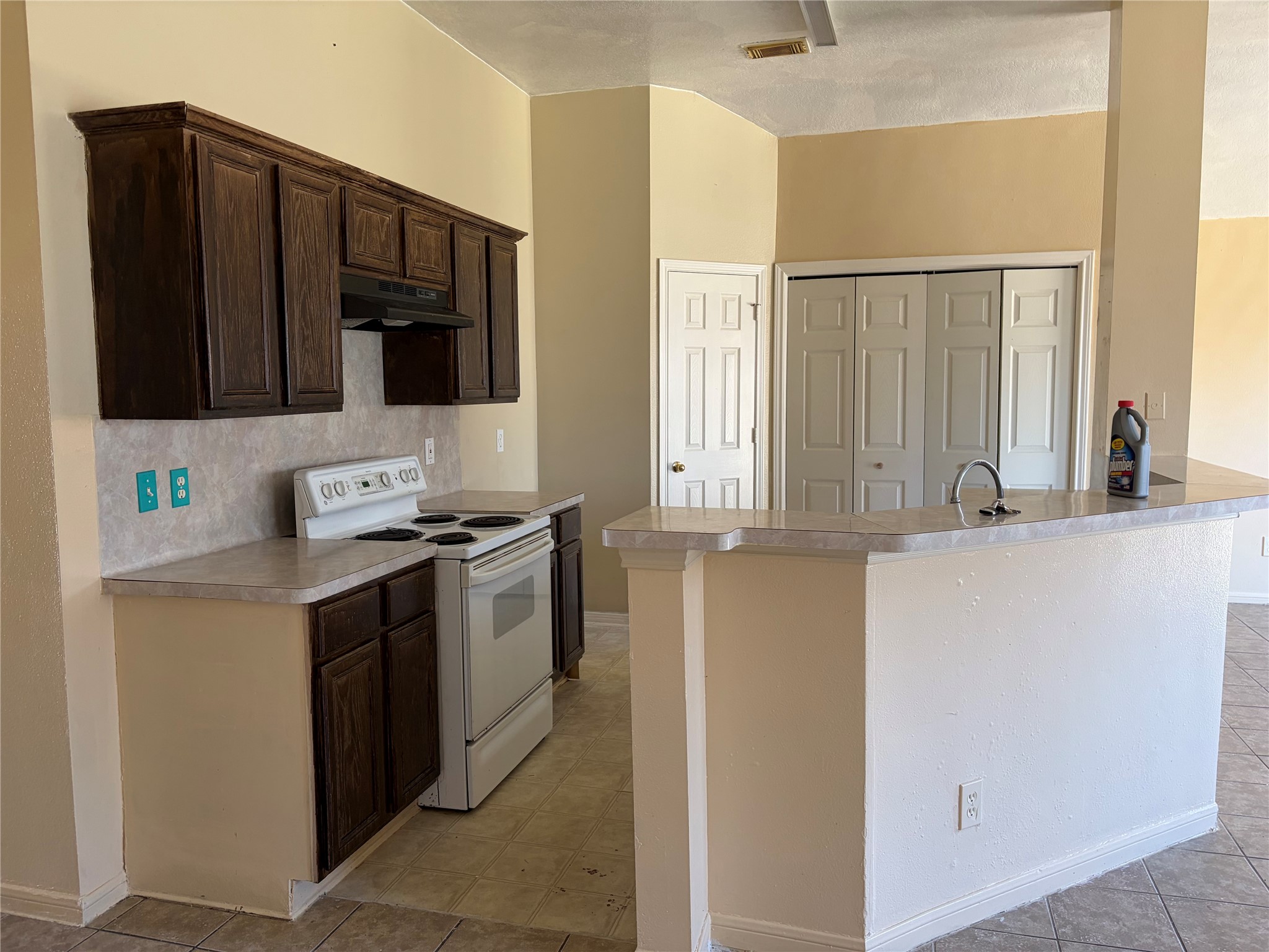 15738 Boonridge Road Houston, TX 77053 - Photo 11 of 22 a kitchen with stainless steel appliances granite countertop a sink and a refrigerator