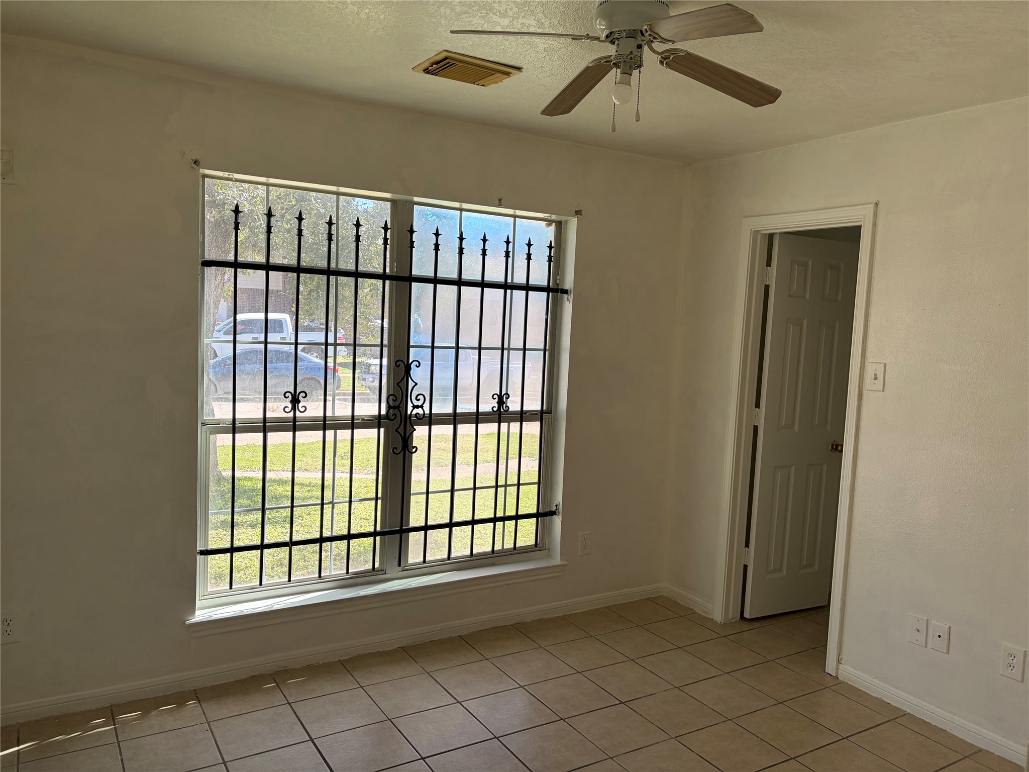 15738 Boonridge Road Houston, TX 77053 - Photo 14 of 22 a view of an empty room with a window
