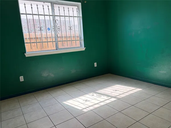 a view of an empty room with window