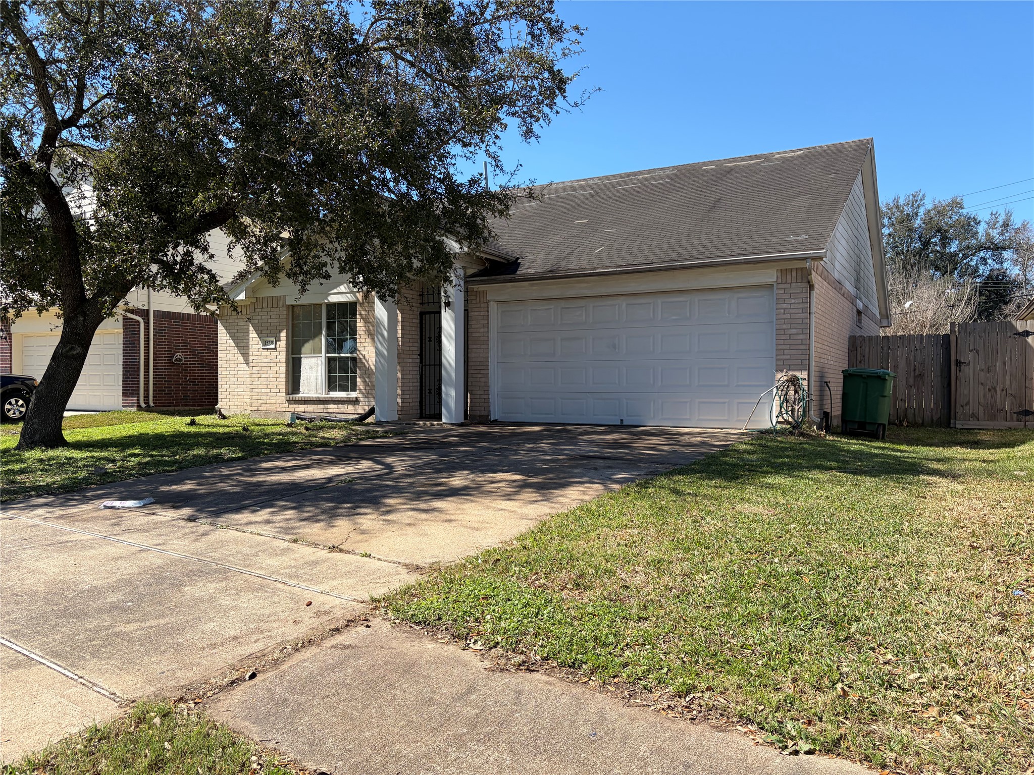 15738 Boonridge Road Houston, TX 77053 - Photo 3 of 22 a front view of house with yard