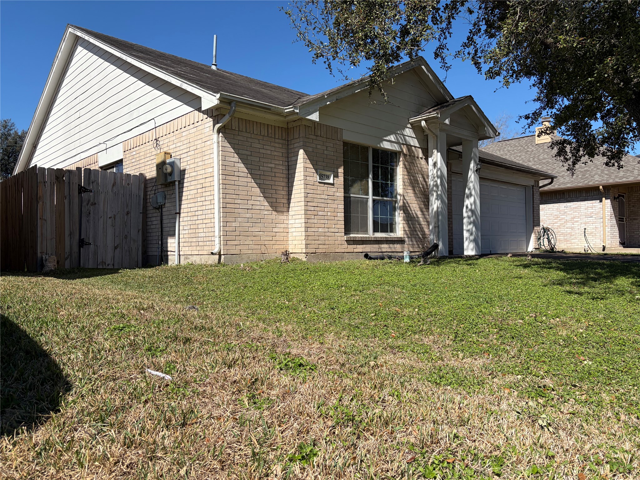 15738 Boonridge Road Houston, TX 77053 - Photo 5 of 22 a view of a house with a yard