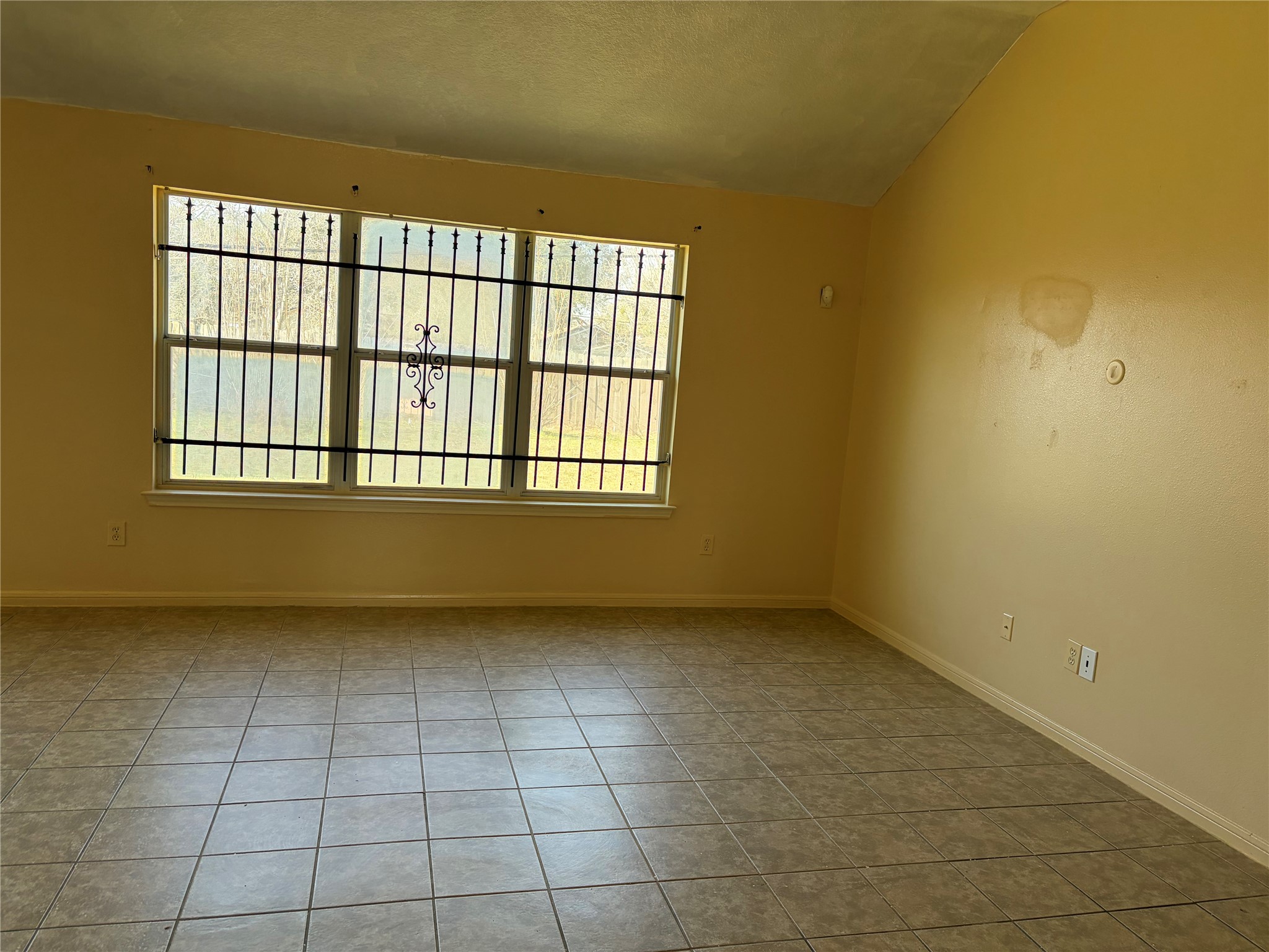 15738 Boonridge Road Houston, TX 77053 - Photo 7 of 22 a view of an empty room with a window