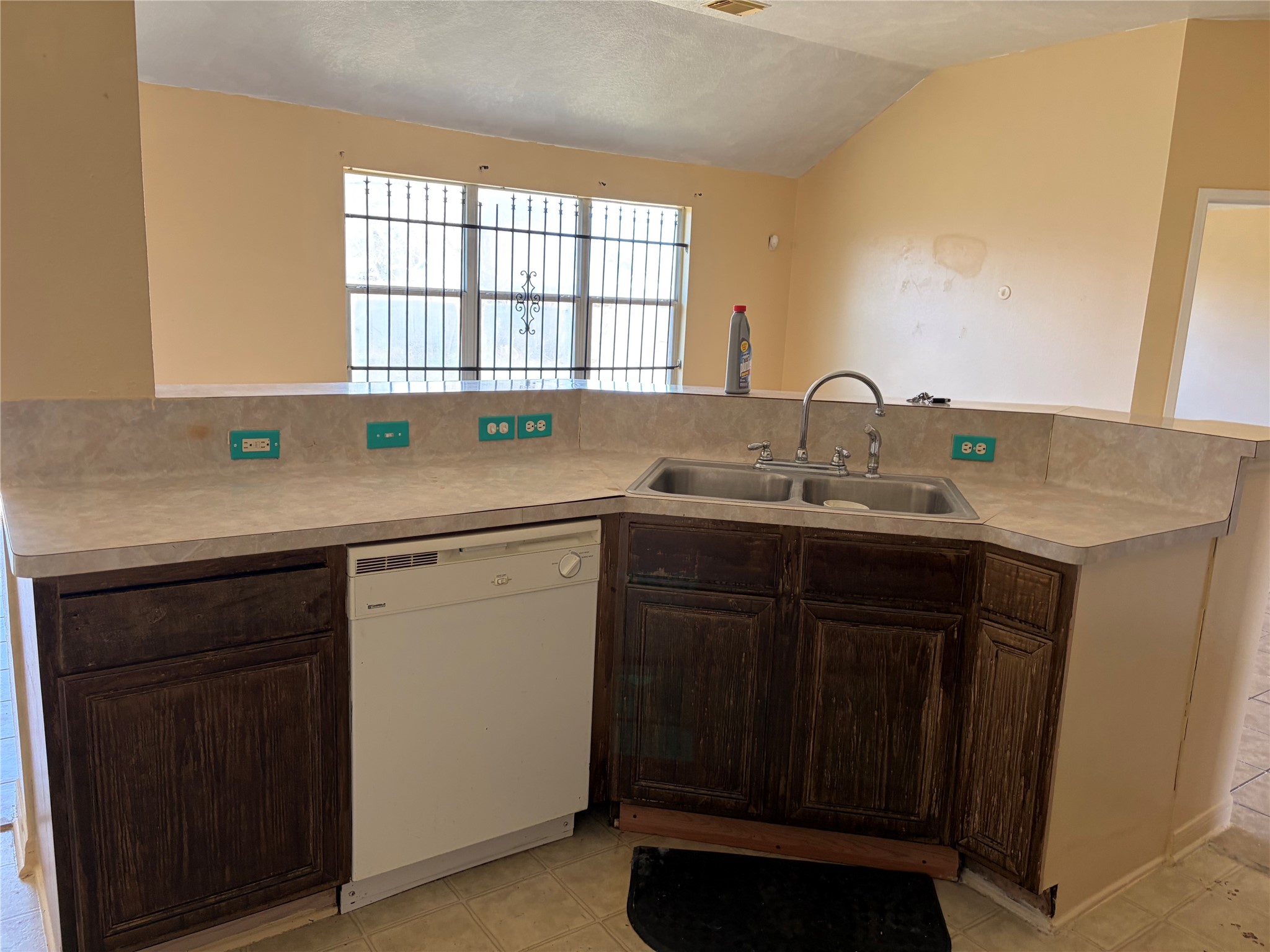 15738 Boonridge Road Houston, TX 77053 - Photo 9 of 22 a kitchen with a sink stove and cabinets