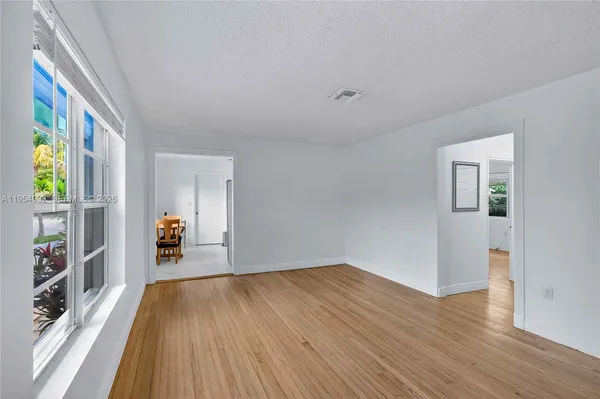 a view of livingroom with furniture and wooden floor