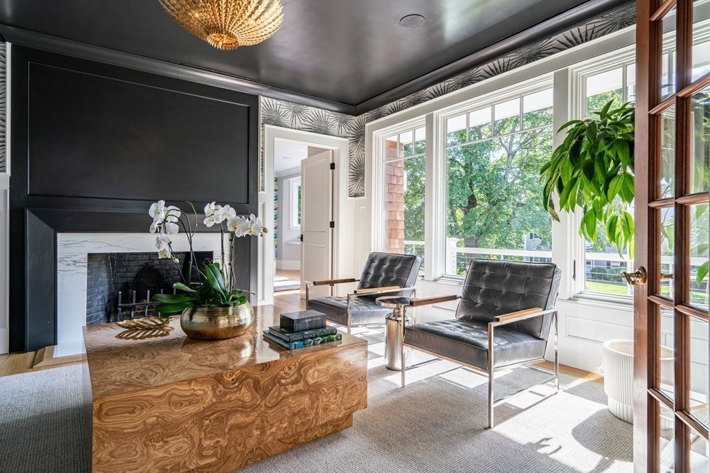 21 Jarvis Avenue Hingham, MA 02043 - Photo 13 of 30 a living room with patio furniture and a potted plant