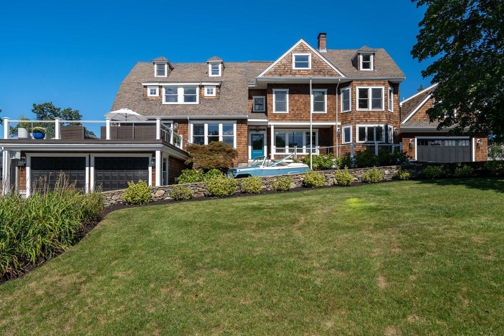 21 Jarvis Avenue Hingham, MA 02043 - Photo 2 of 30 a front view of a house with garden