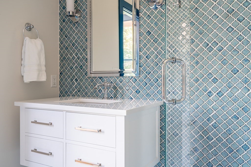 21 Jarvis Avenue Hingham, MA 02043 - Photo 23 of 30 a bathroom with a sink and a mirror