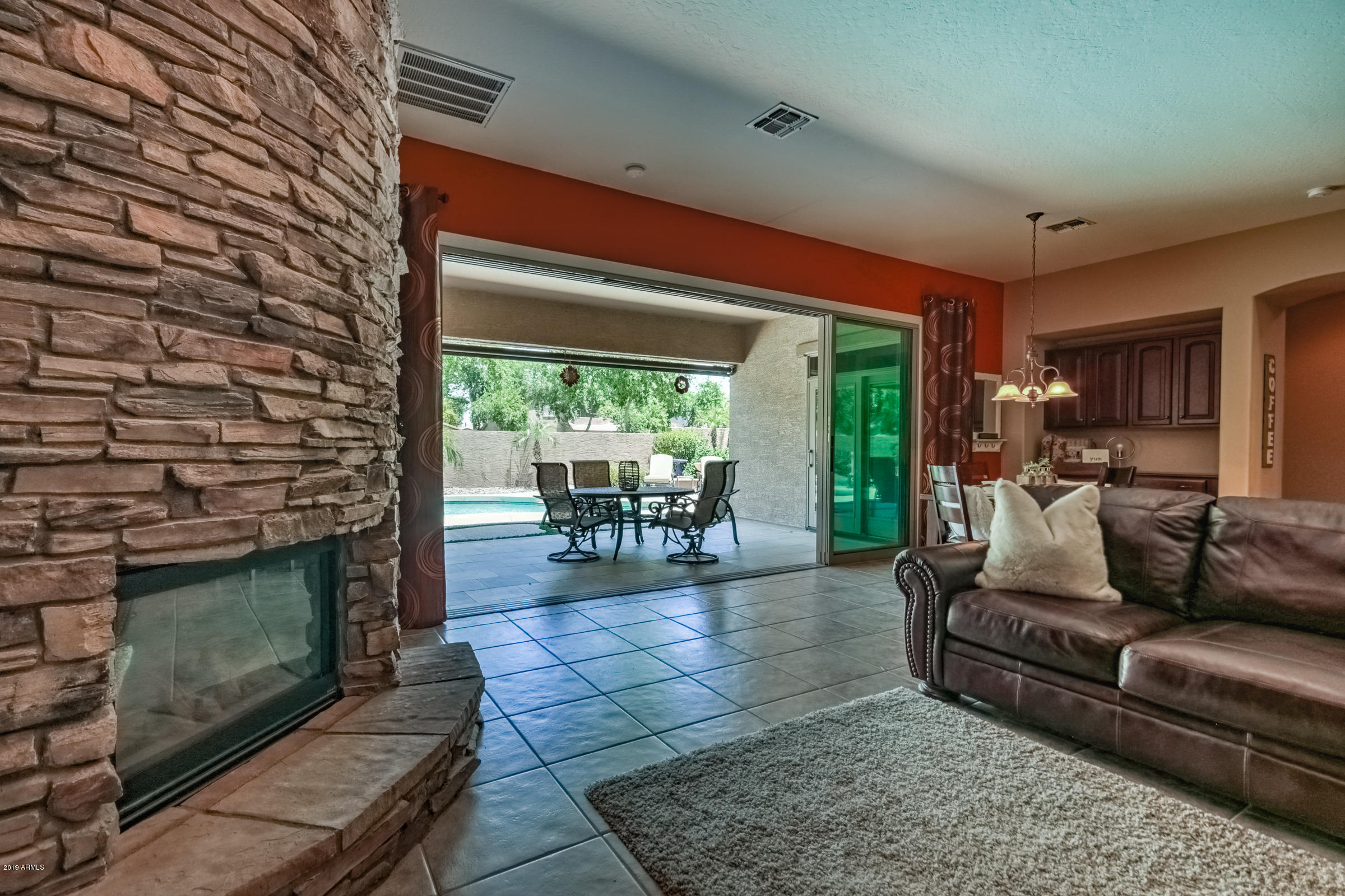 4324 East Reins Road Gilbert, AZ 85297 - Photo 8 of 33 Fireplace / Family Room