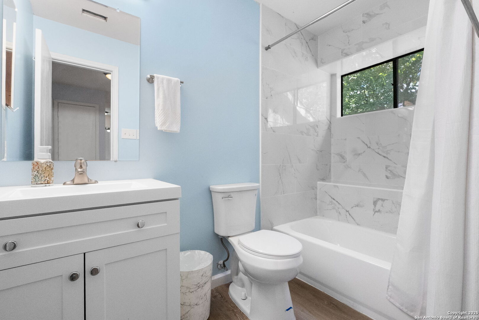 3813 Ogelthorpe Circle Schertz, TX 78154 - Photo 24 of 32 a bathroom with a sink a toilet and shower