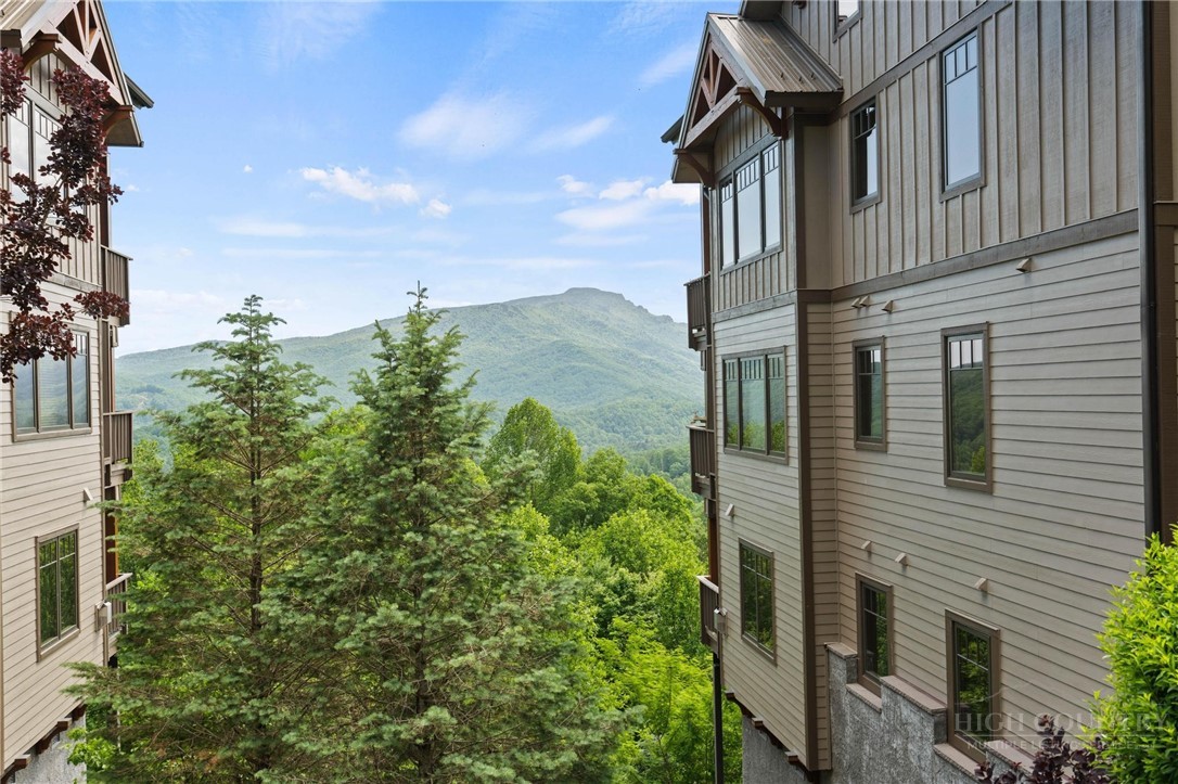 142 Evening View Lane, Unit CA3 Boone, NC 28607 - Photo 24 of 41 a view of a house with a yard