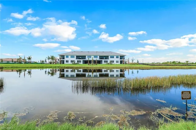 a view of a lake with a big yard