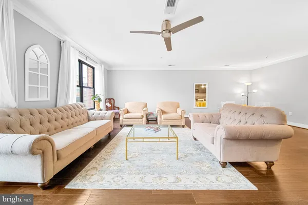 a living room with furniture and a couch