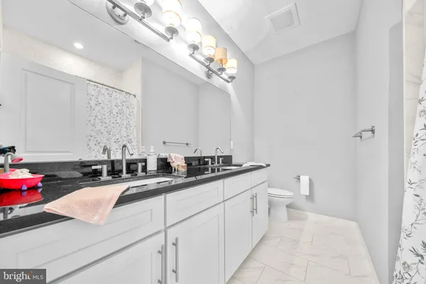 a view of balcony with wooden floor