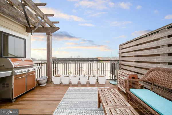 a view of building exterior with seating space