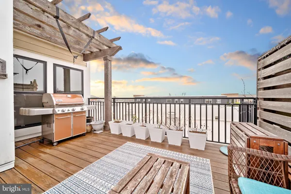 an aerial view of a house with outdoor space