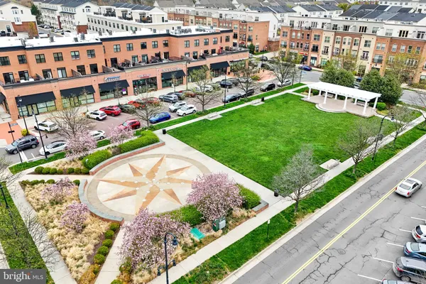 a living room with a chair and painted walls