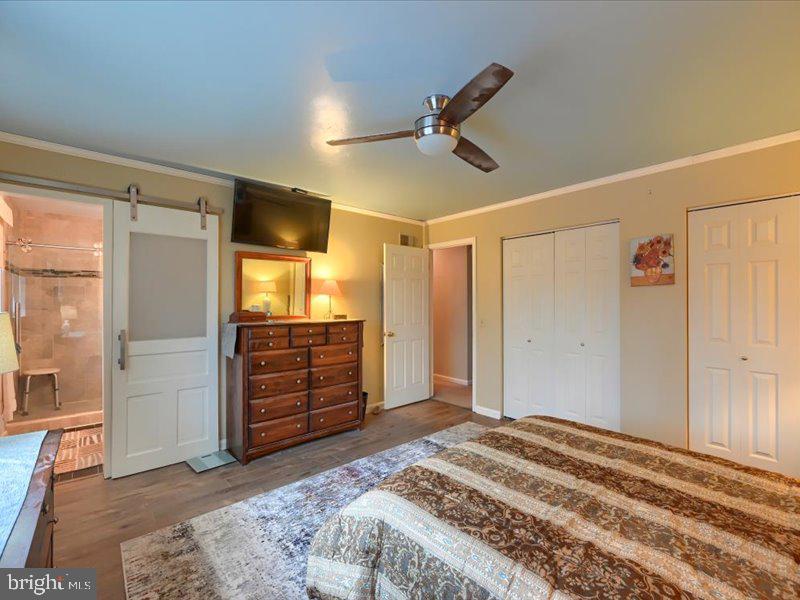 301 Larkin Drive Red Lion, PA 17356 - Photo 40 of 61 a bedroom with a bed and a walk in closet